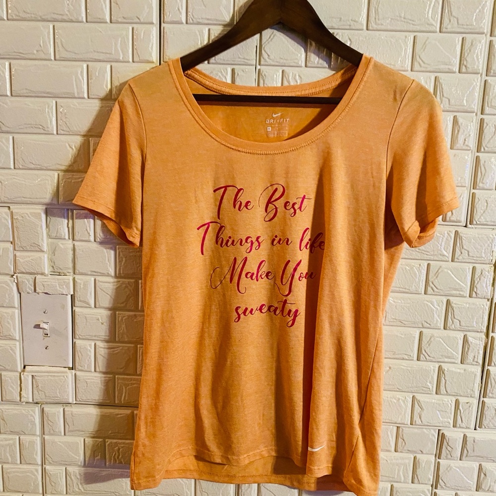 Nike woman's T-shirt peach color size M 100% polyester